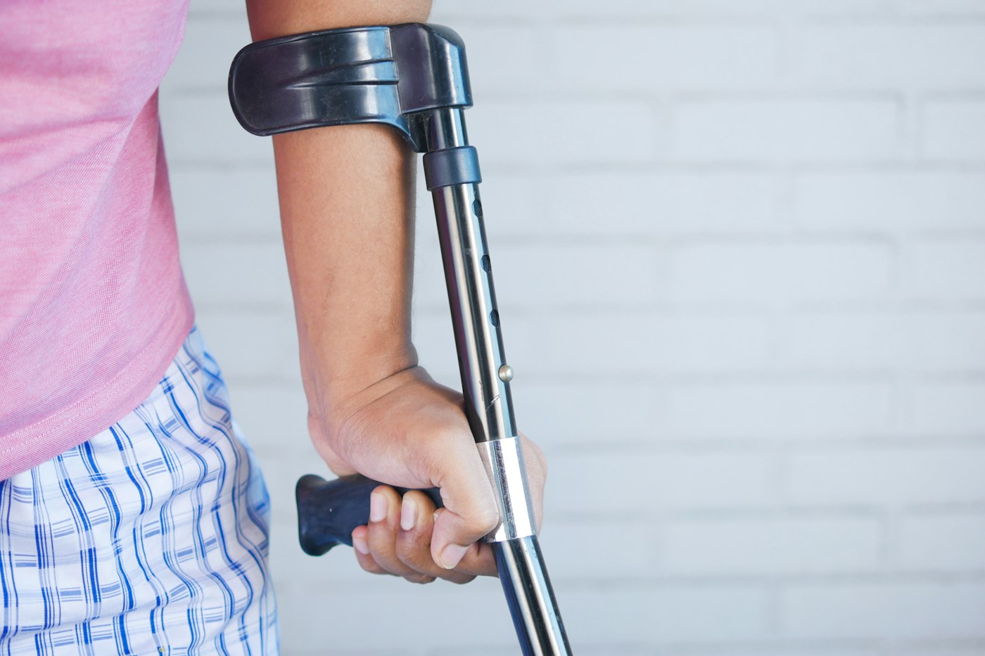 Person on crutches - accidental injury cover